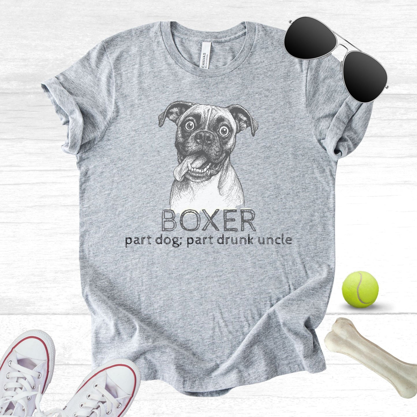 Unisex Zeke Squad T-shirt with the phrase “Boxer dogs: the drunk uncles of the dog world,” celebrating their silly, goofy personalities.