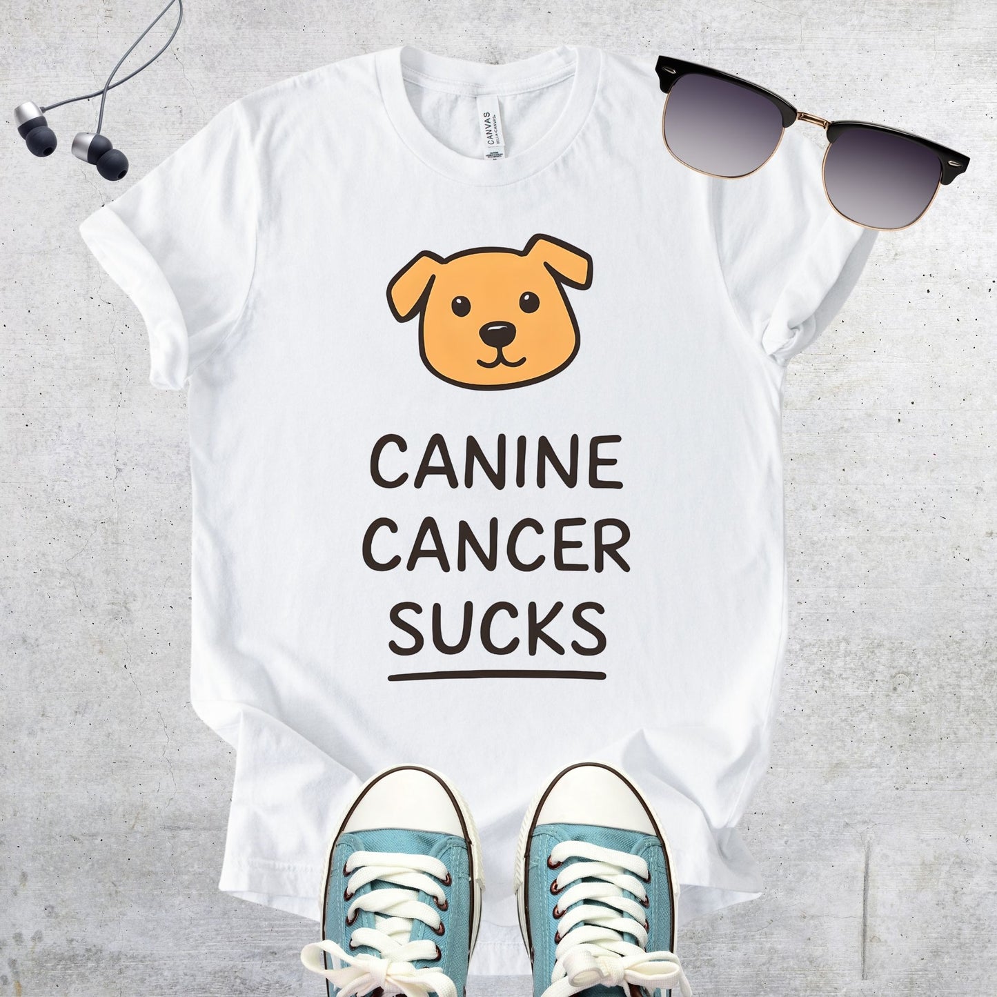 Unisex Zeke Squad T-shirt with the message “Canine Cancer Sucks” made for dog parents and advocates who’ve faced canine cancer.