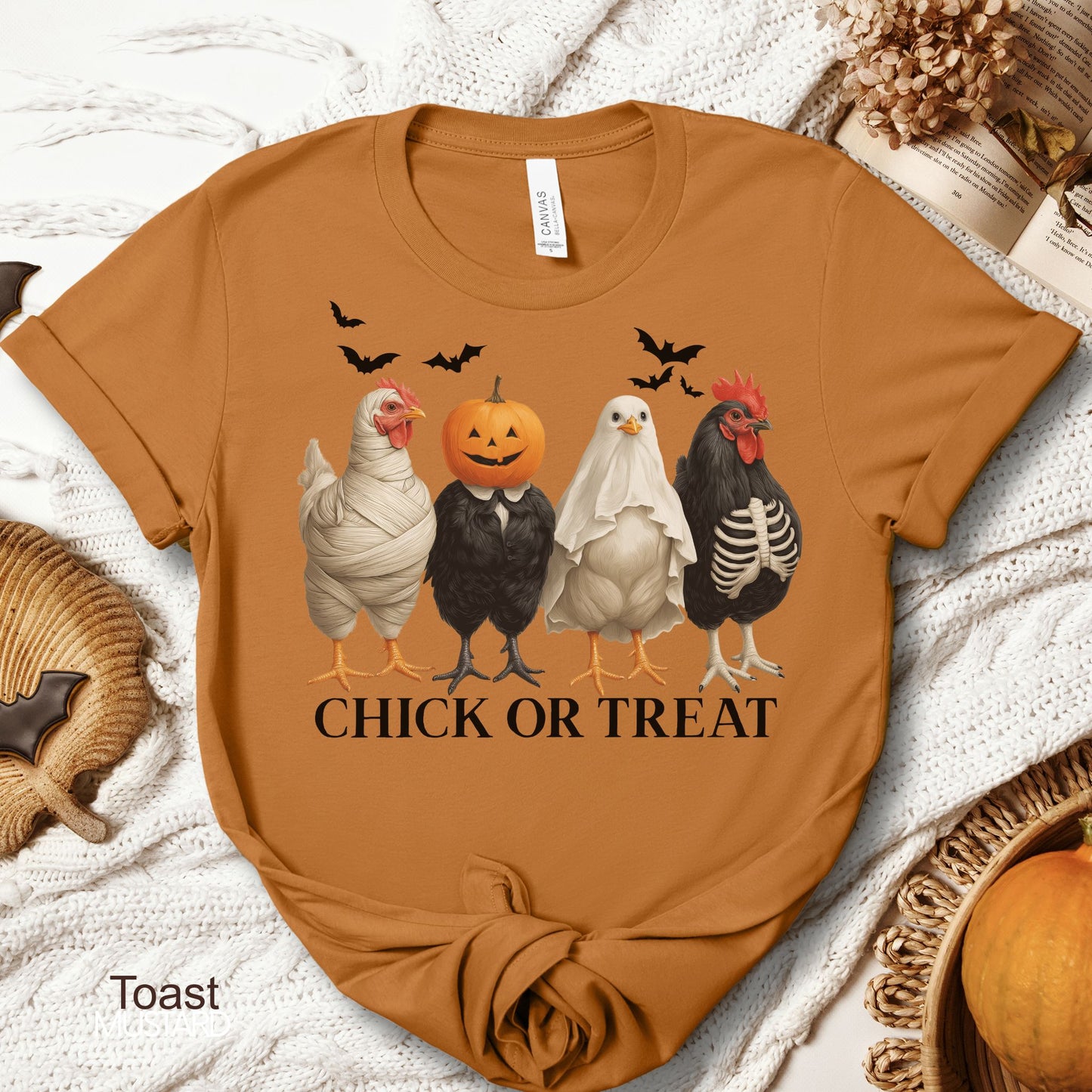 Unisex Zeke Squad Halloween T-shirt with the phrase “Chick or Treat” featuring chickens in spooky costumes.
