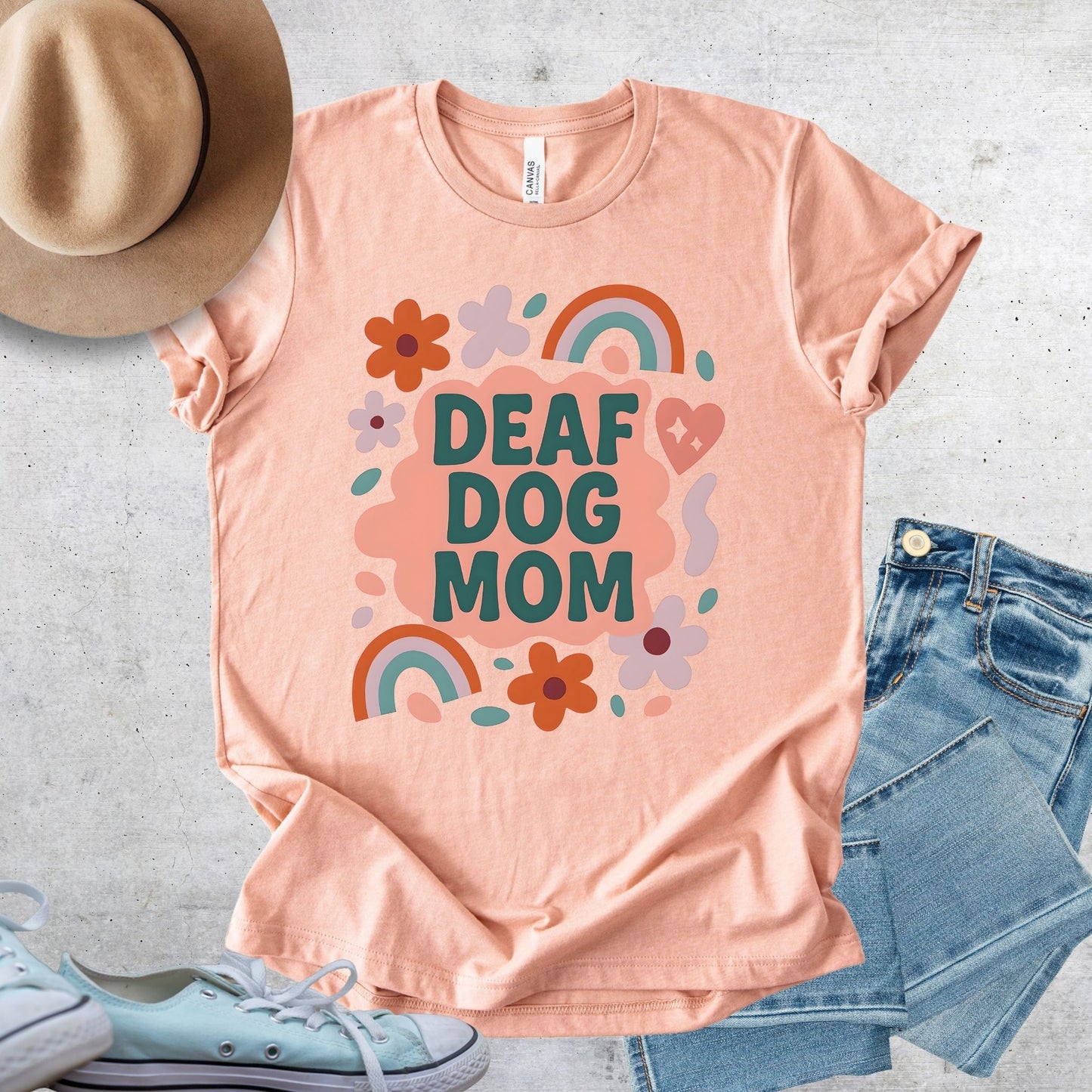 Unisex Zeke Squad floral T-shirt with the phrase “Deaf Dog Mom” for proud dog parents and advocates.