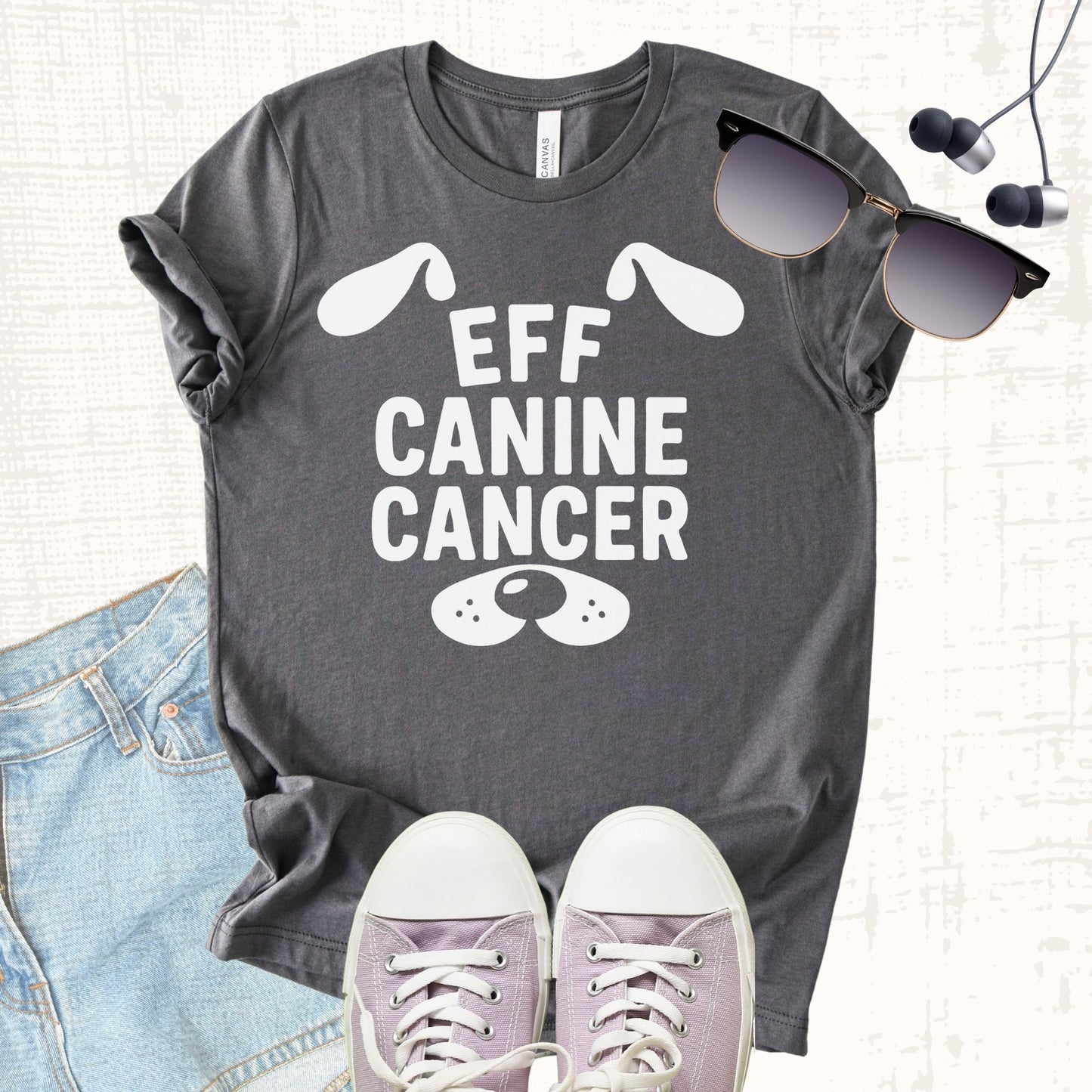 Unisex Zeke Squad T-shirt with the awareness message “Eff Canine Cancer” for dog lovers and advocates.