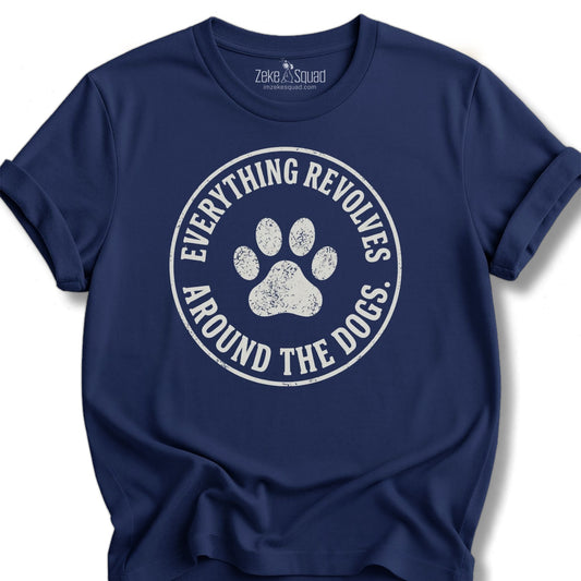 Heather mauve unisex graphic tee with a round paw print emblem reading everything revolves around the dogs, Bella Canvas 3001