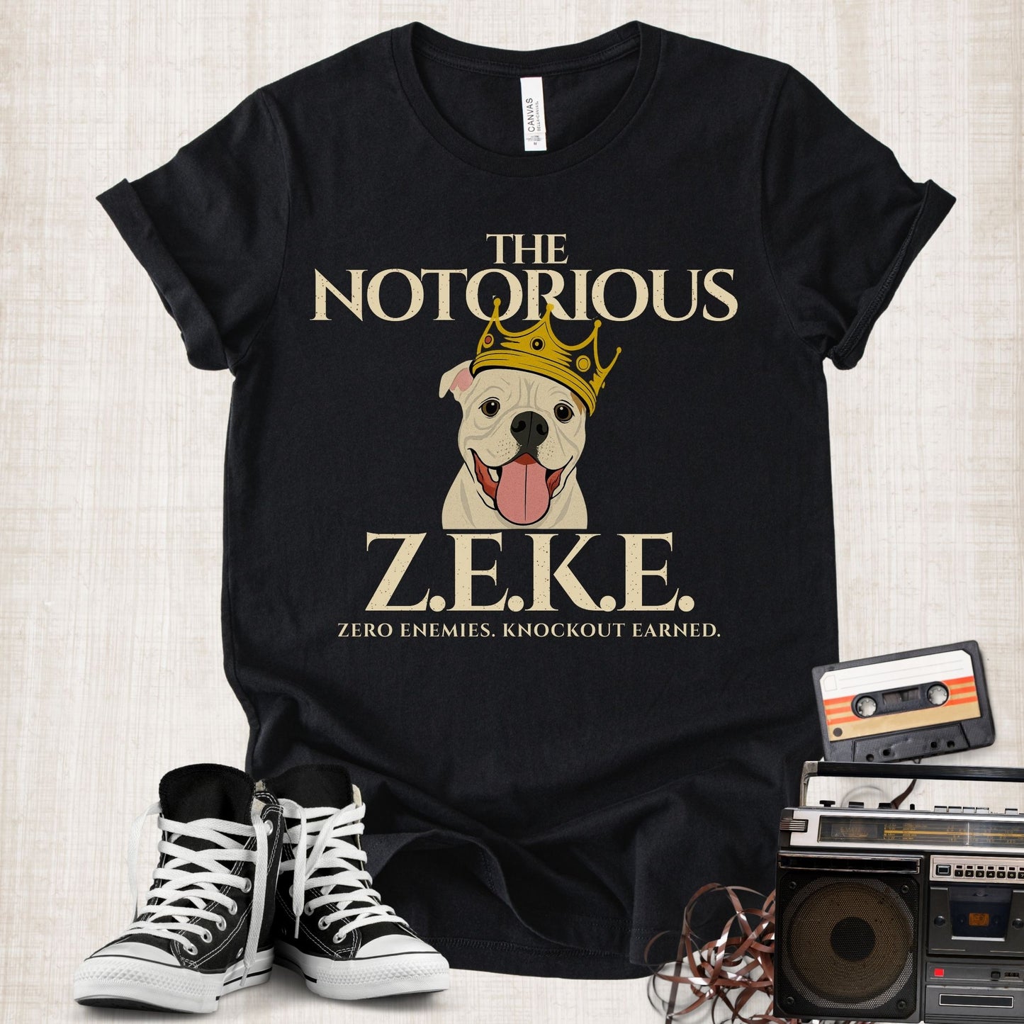 Unisex Zeke Squad T-shirt with the tribute “The Notorious Zeke,” honoring a canine cancer warrior and survivor.