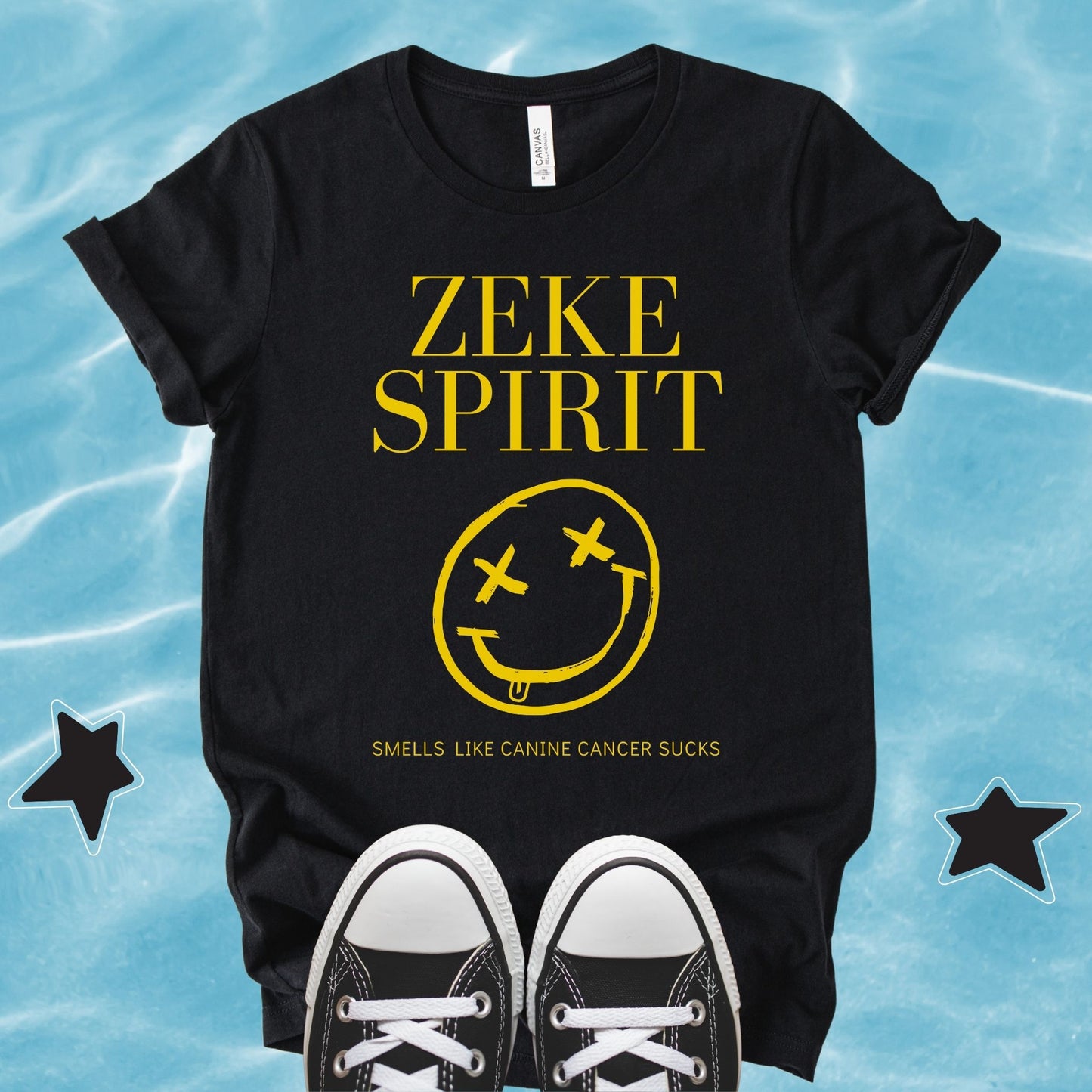 Unisex retro-inspired Zeke Squad T-shirt with the quote “Zeke Spirit, Smells Like Canine Cancer Sucks” for dog lovers and awareness.