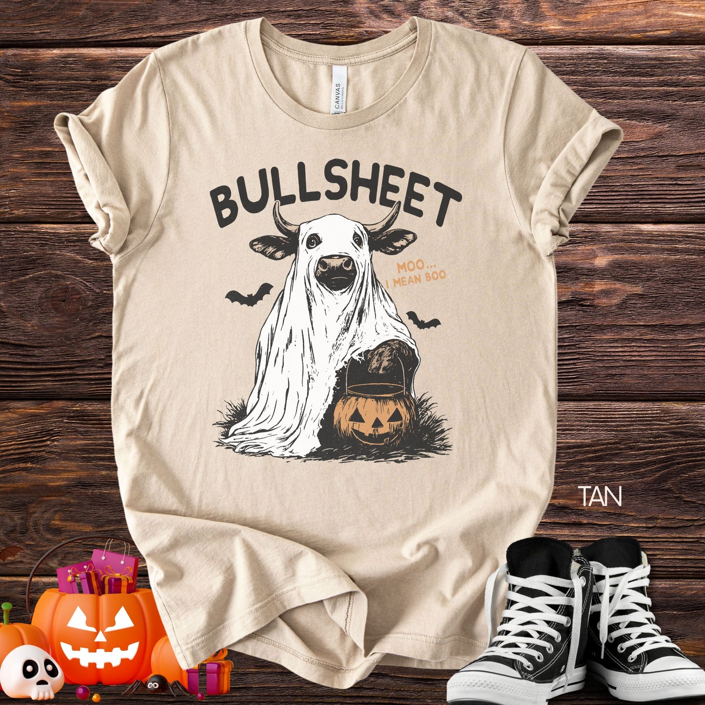Unisex Zeke Squad Halloween T-shirt with the phrase “Bullsheet” featuring a bull in a ghost sheet holding a trick-or-treat basket.