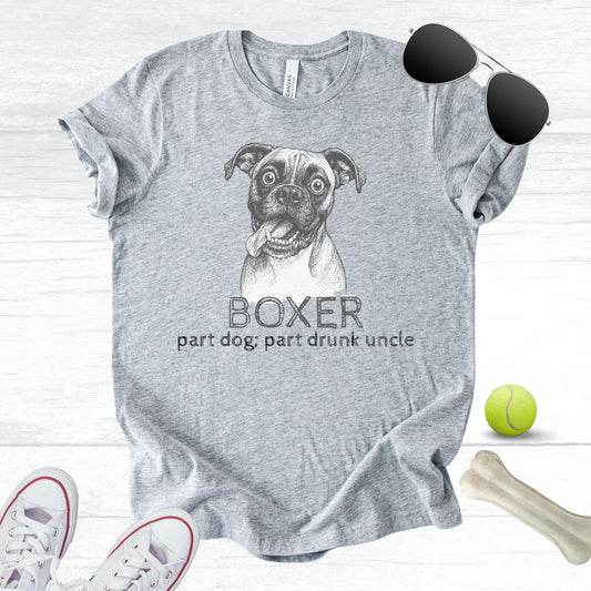 Unisex Zeke Squad T-shirt with the phrase “Boxer dogs: the drunk uncles of the dog world,” celebrating their silly, goofy personalities.