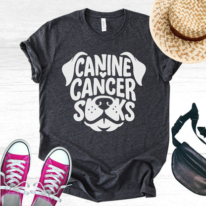 Unisex Zeke Squad T-shirt with the awareness message “Canine Cancer Sucks” for dog parents who have faced canine cancer.

