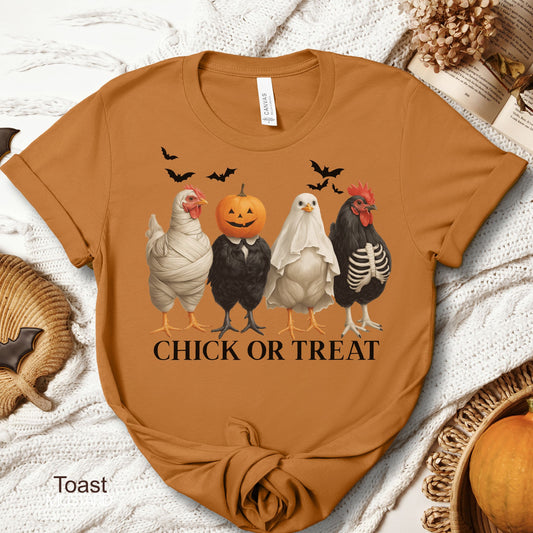 Unisex Zeke Squad Halloween T-shirt with the phrase “Chick or Treat” featuring chickens in spooky costumes.