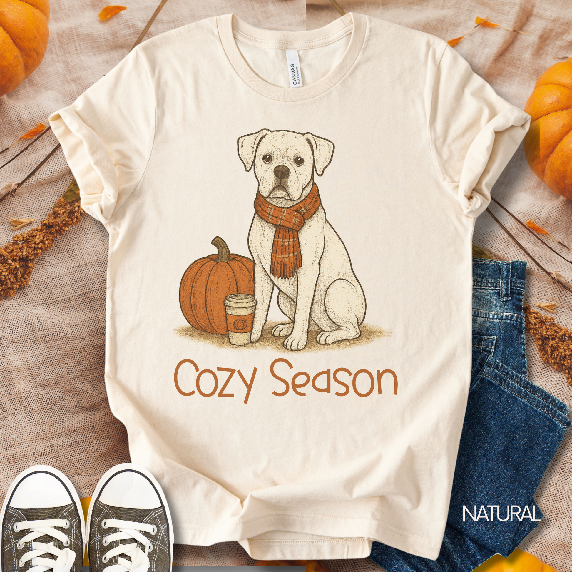 Unisex Zeke Squad fall t-shirt with the phrase “Cozy Season” featuring a white Boxer sitting with a cup of coffee.