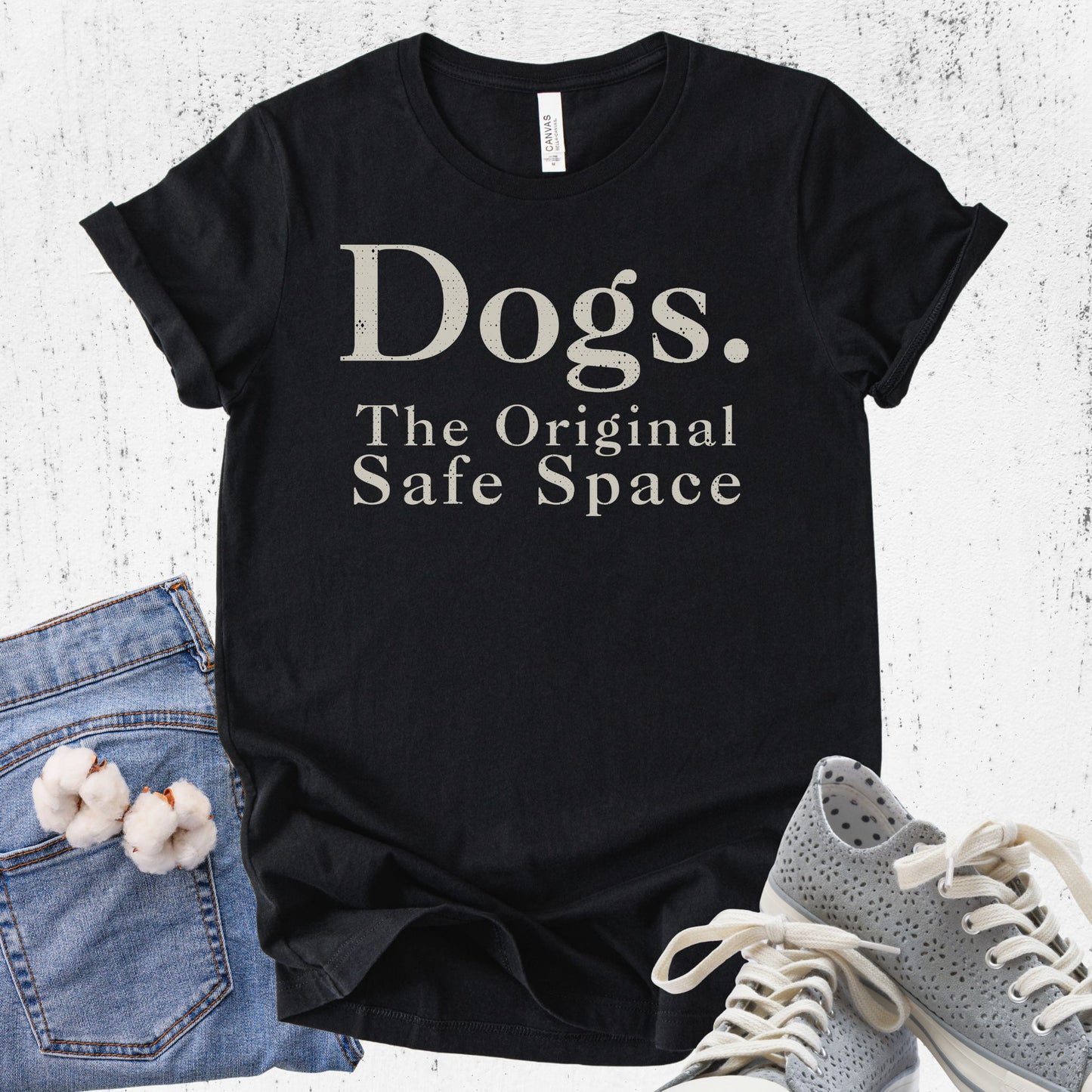 Unisex Zeke Squad T-shirt with the phrase “Dogs. The original safe space” for dog lovers and pet parents.

