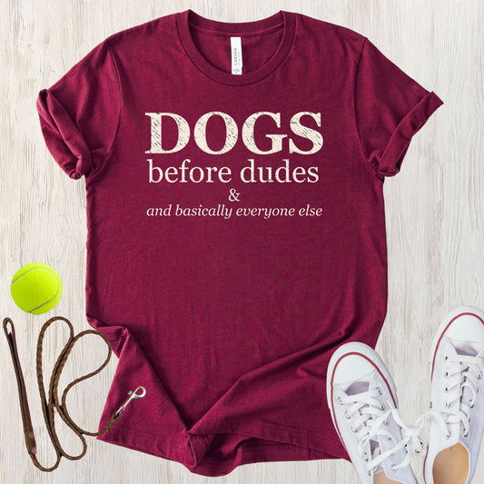 Unisex Zeke Squad T-shirt with funny quote “Dogs before dudes and basically everyone else” for dog lovers.