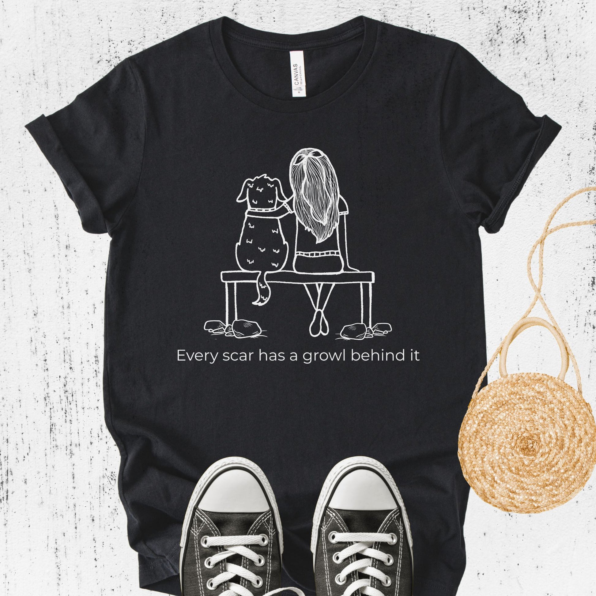 Unisex Zeke Squad T-shirt with the awareness phrase “Every growl has a scar behind it” for misunderstood and traumatized dogs.