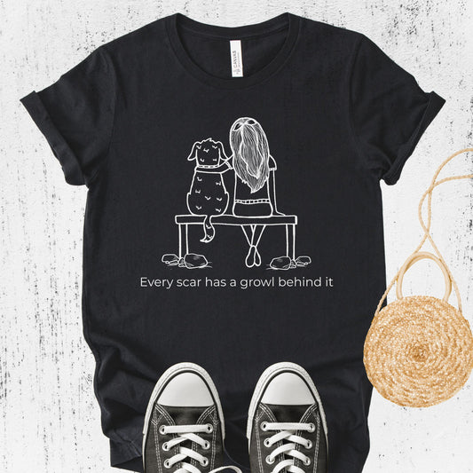 Unisex Zeke Squad T-shirt with the awareness phrase “Every growl has a scar behind it” for misunderstood and traumatized dogs.