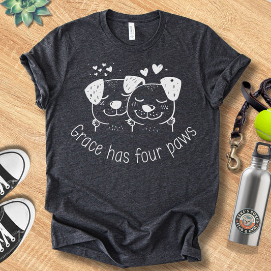 Unisex Zeke Squad t-shirt with the phrase “Grace Has Four Paws,” a heartfelt design celebrating the faith and forgiveness dogs teach us.