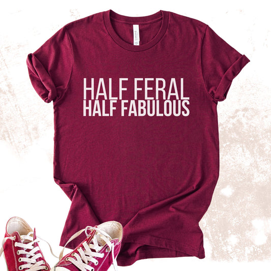 Unisex Zeke Squad T-shirt with the funny phrase “Half Feral Half Fabulous” for unapologetic misfits.