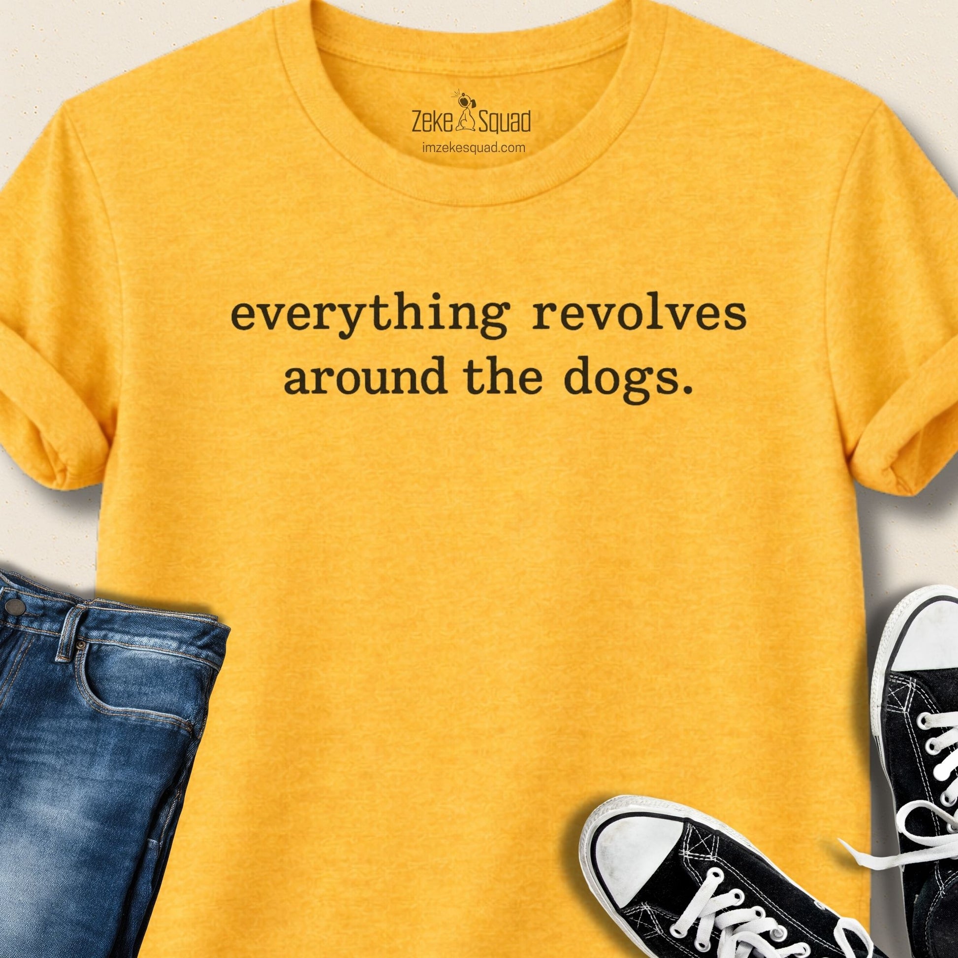 Heather yellow gold unisex graphic tee printed with the phrase everything revolves around the dog across the chest, Bella Canvas 3001