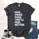 Unisex Zeke Squad T-shirt with the phrase “Hug more dogs, you’ll feel better” for dog lovers.