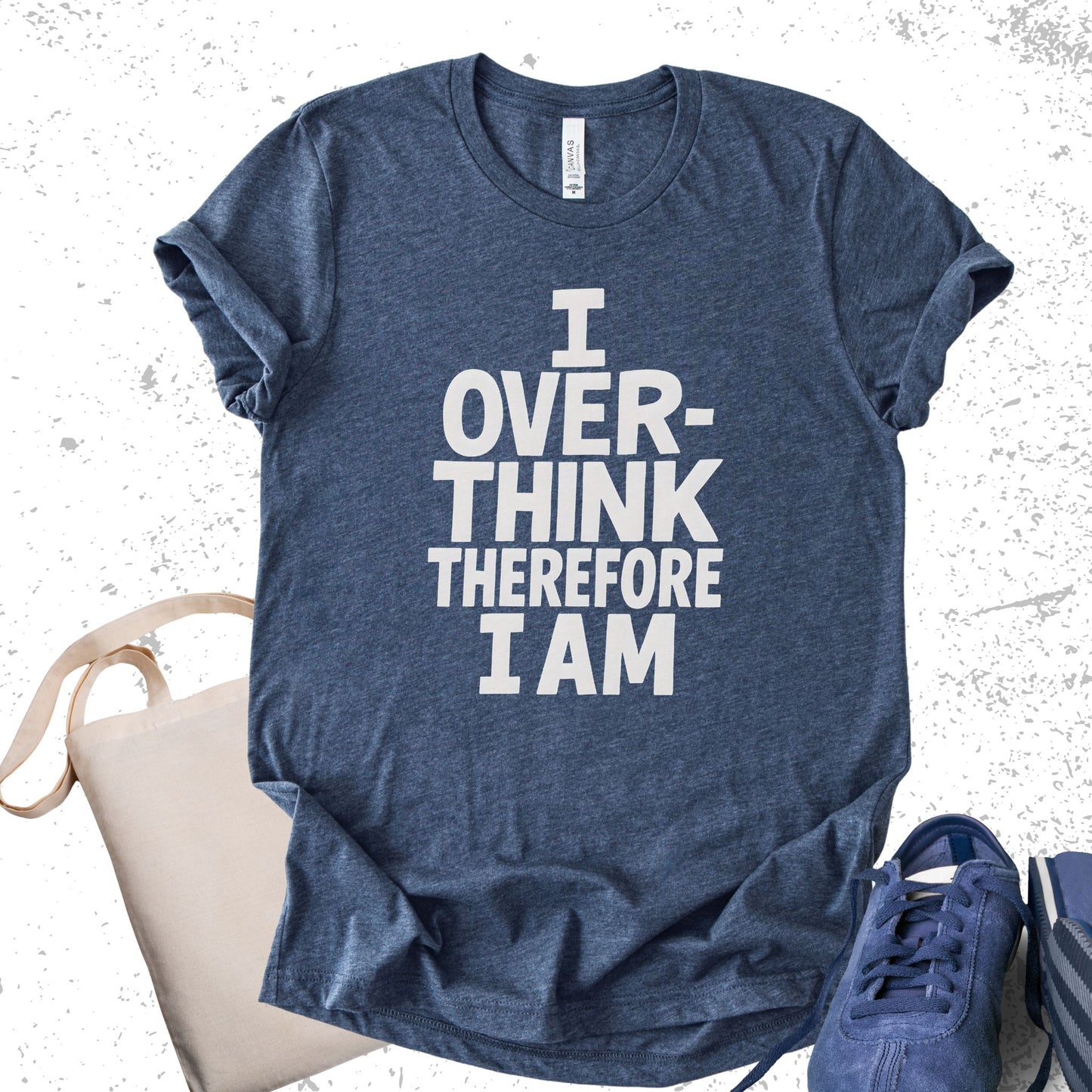 Unisex Zeke Squad T-shirt with the phrase “I Overthink, Therefore I Am” designed for misfits and neurodivergent individuals.