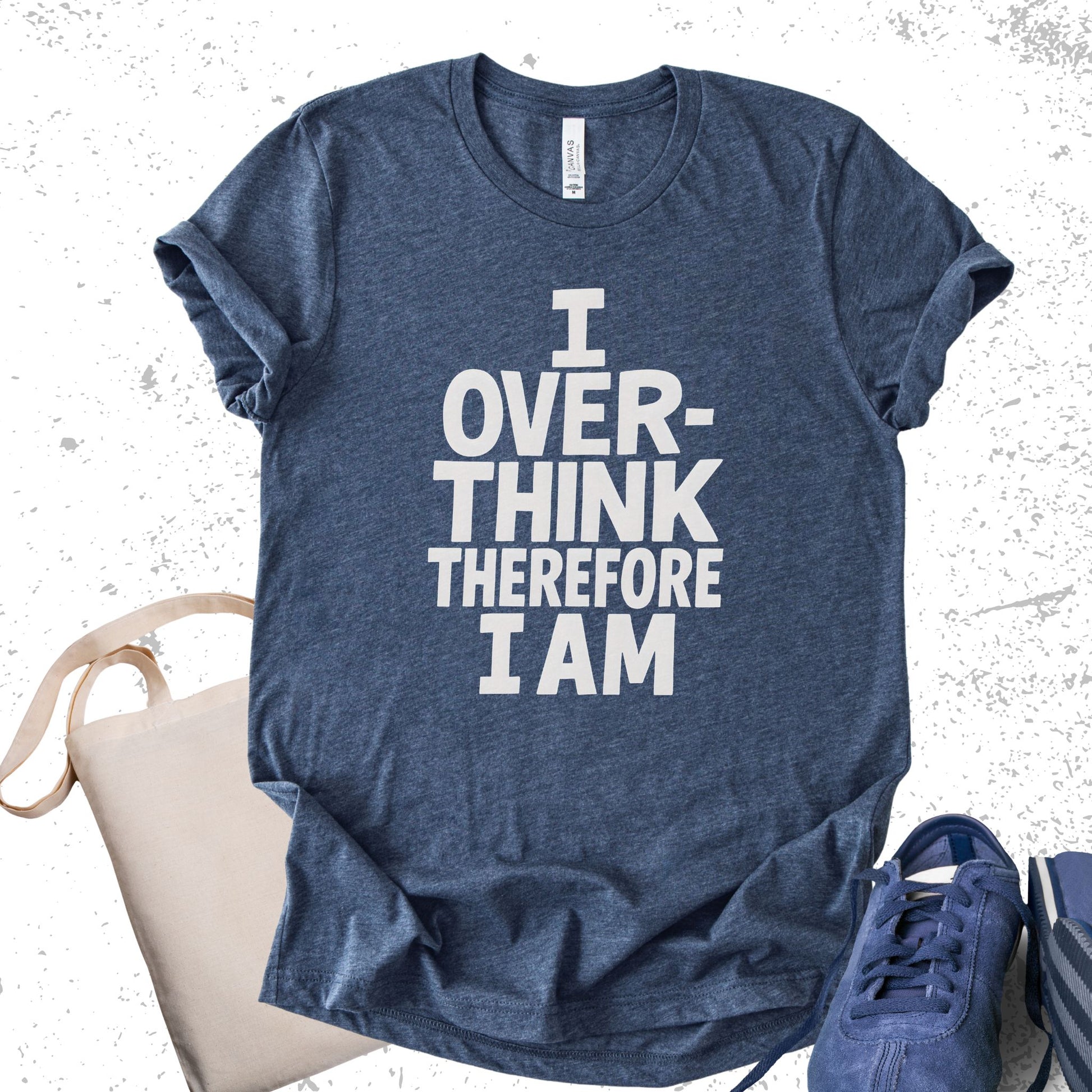 Unisex Zeke Squad T-shirt with the phrase “I Overthink, Therefore I Am” designed for misfits and neurodivergent individuals.