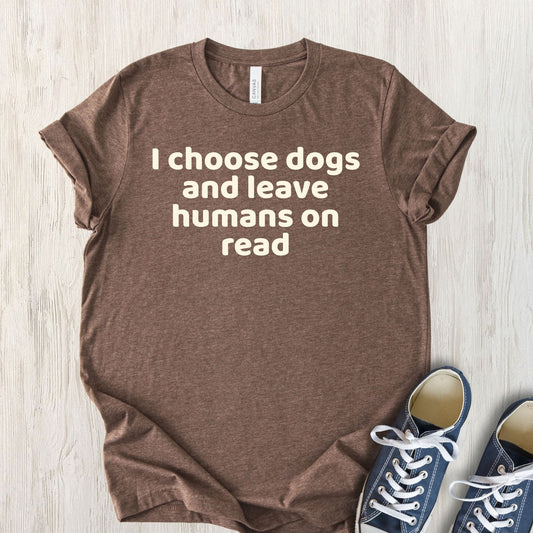 Unisex Zeke Squad T-shirt with the funny quote “I choose dogs and leave humans on read” for dog lovers.
