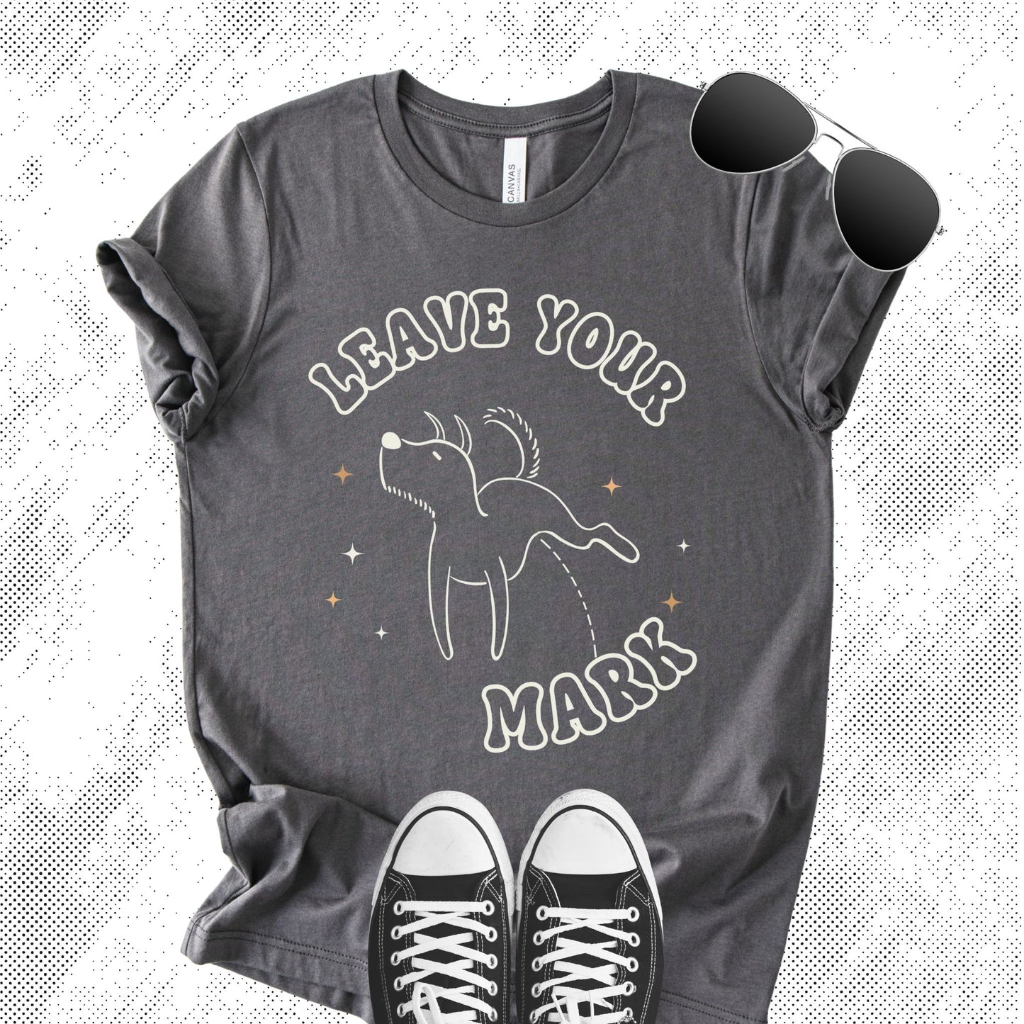 Unisex Zeke Squad T-shirt with the phrase “Leave Your Mark” featuring a funny graphic of a dog peeing.