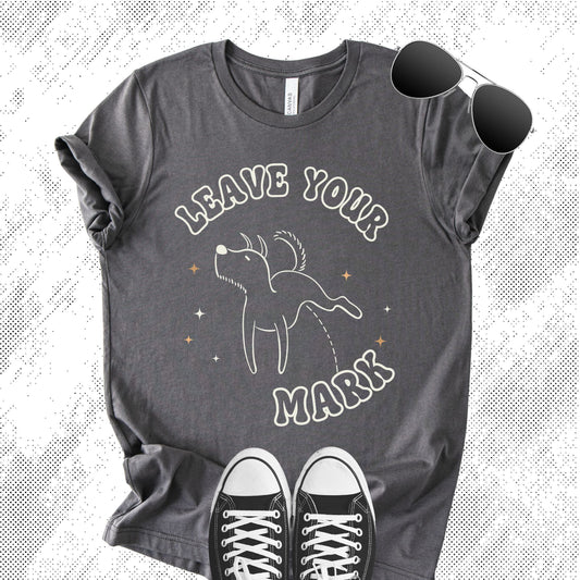 Unisex Zeke Squad T-shirt with the phrase “Leave Your Mark” featuring a funny graphic of a dog peeing.