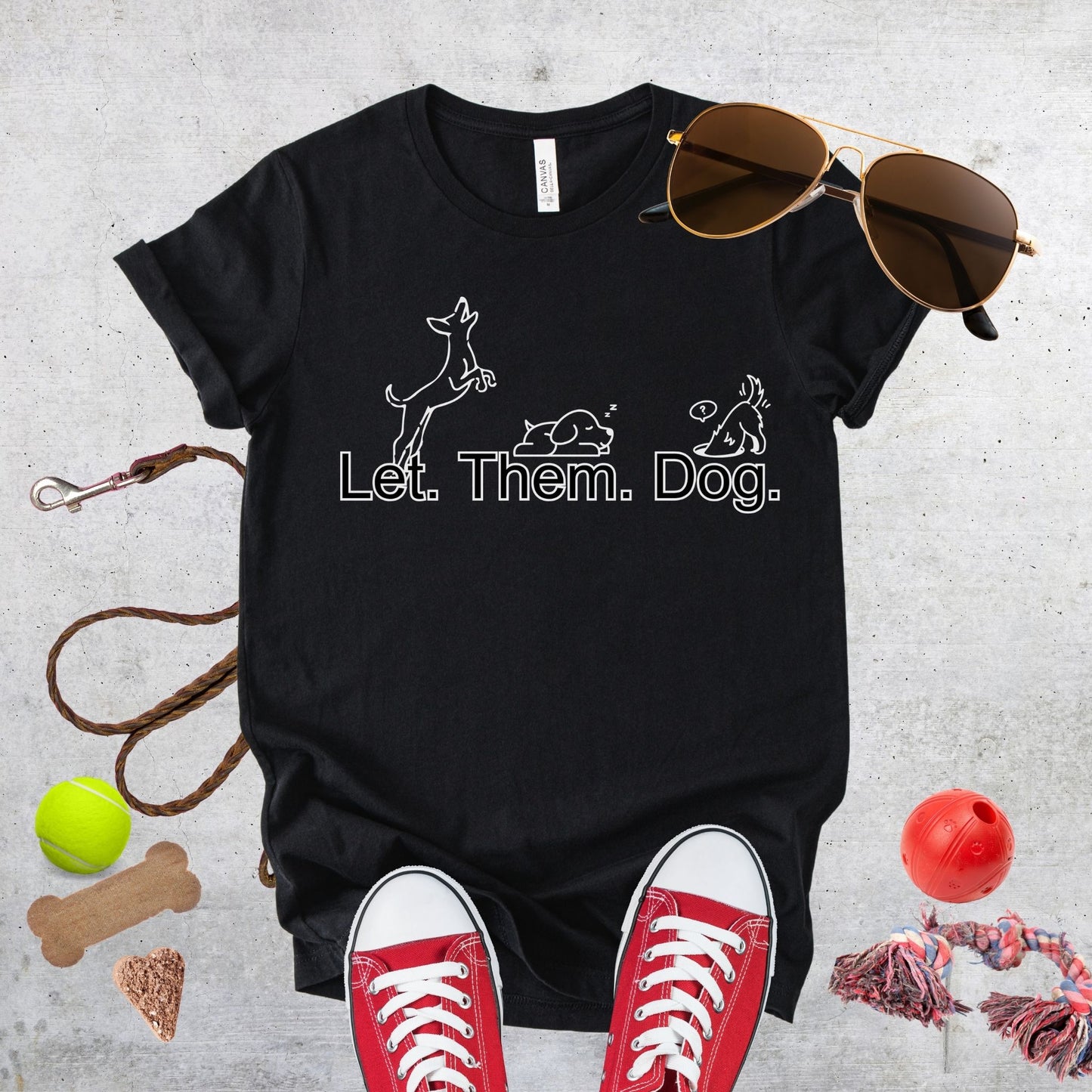 Unisex Zeke Squad T-shirt with the bold statement “Let Them Dog” for dog lovers and pet parents.
