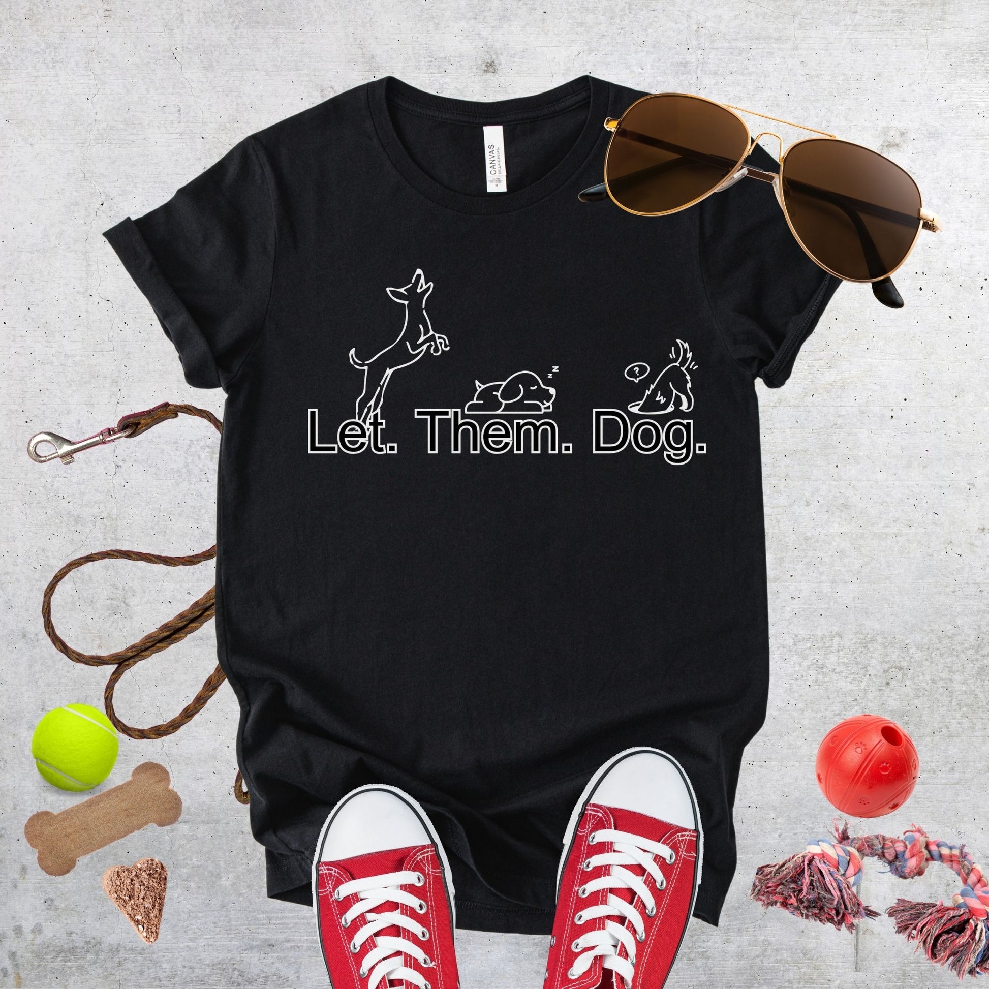 Unisex Zeke Squad T-shirt with the bold statement “Let Them Dog” for dog lovers and pet parents.
