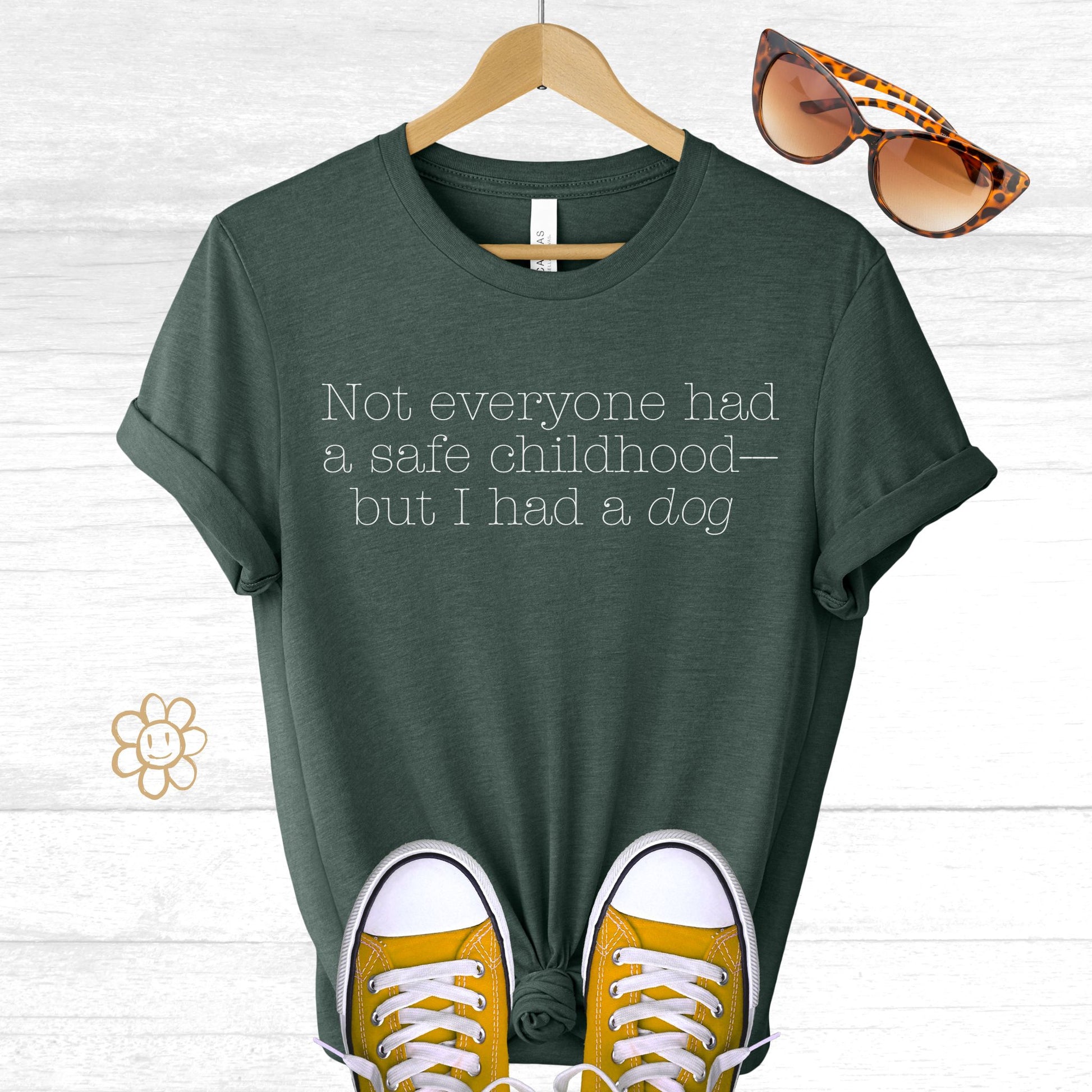 Unisex Zeke Squad T-shirt with the phrase “Not everyone had a safe childhood, but I had a dog” for dog lovers and survivors.