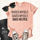 Unisex Zeke Squad T-shirt with the phrase “Raised myself. Saved myself. Dogs helped” for survivors and dog lovers.