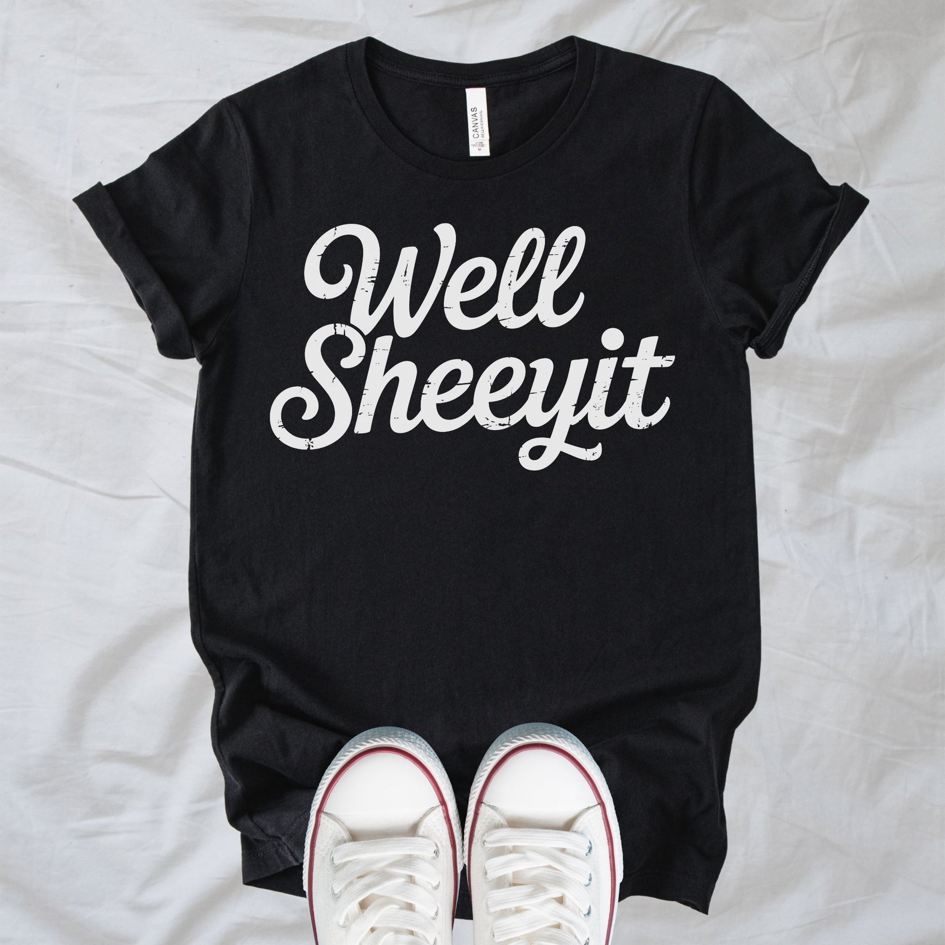 Unisex Zeke Squad T-shirt with the phrase “Sheeyit,” a funny expression for life’s daily frustrations.