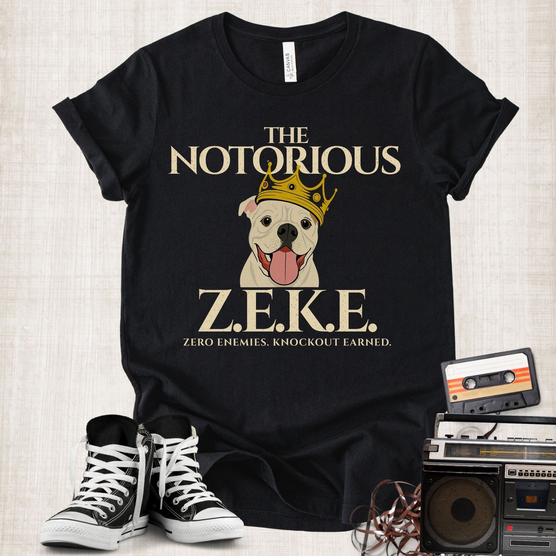 Unisex Zeke Squad T-shirt with the tribute “The Notorious Zeke,” honoring a canine cancer warrior and survivor.
