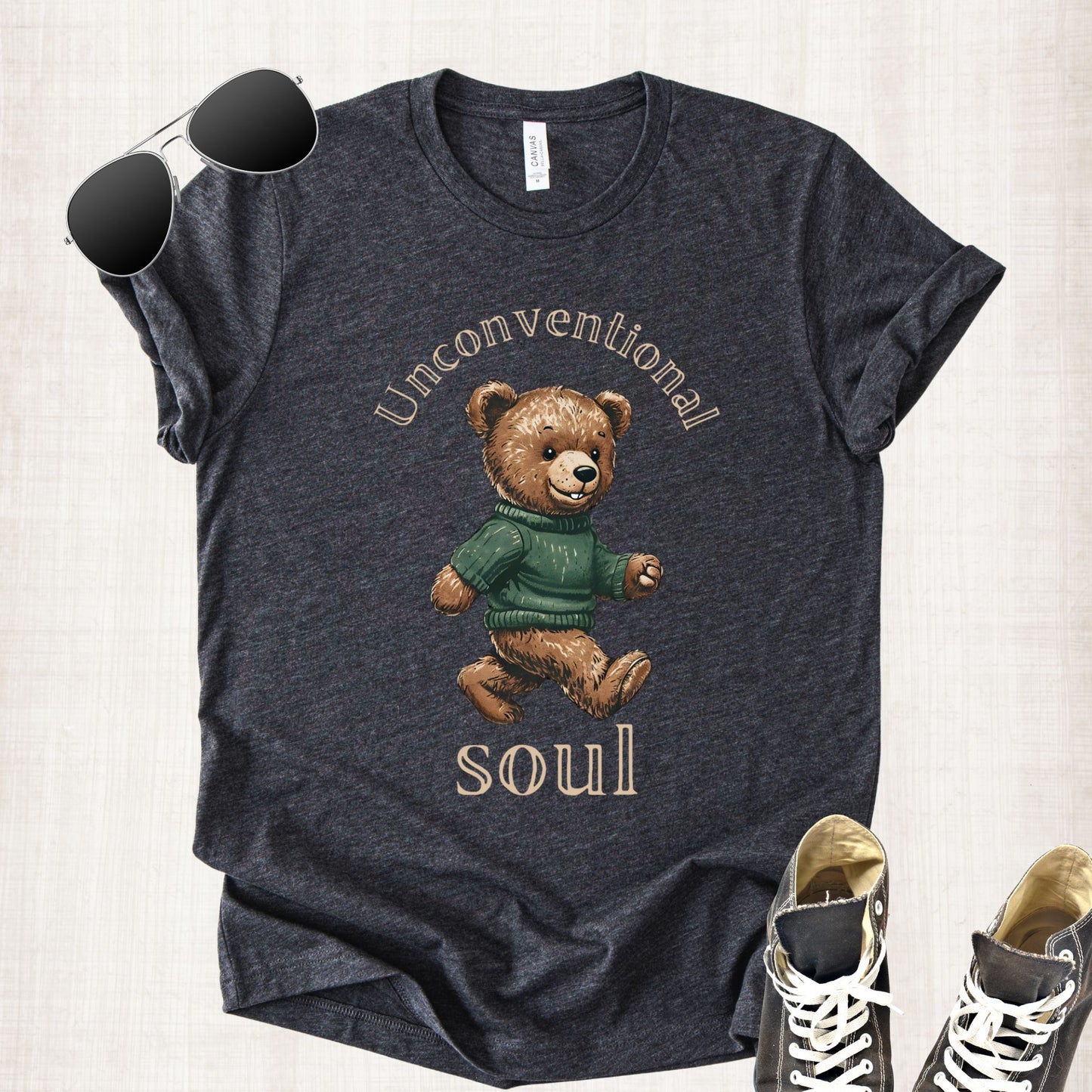 Unisex Zeke Squad T-shirt with the phrase “Unconventional Soul” and a cute bear graphic for misfits and dreamers.