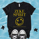 Unisex retro-inspired Zeke Squad T-shirt with the quote “Zeke Spirit, Smells Like Canine Cancer Sucks” for dog lovers and awareness.
