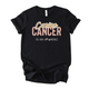 Black t-shirt with 'Canine CANCER IS AN A**HOLE' text on a white background