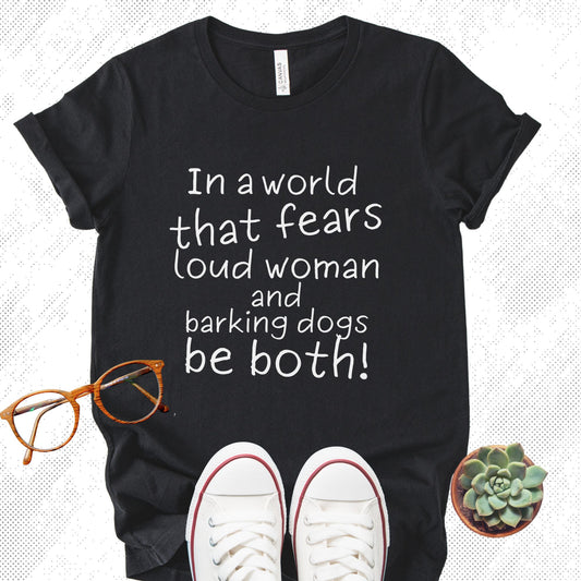 Unisex Zeke Squad T-shirt with the bold statement “In a world that fears loud women and dogs, be both” for unapologetic dog lovers.
